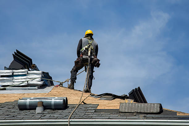 Professional Metal Roofing technician working in Winchester Center, CT